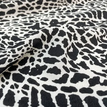 145cm Plotis Madinga Juoda ir balta leopardo spausdintas poliesterio viskozės audinys moterims Vasarinė suknelė Palaidinės kelnės 